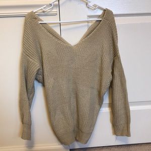 Sweater with twisted back